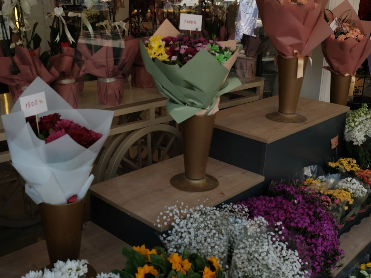 Colourful bouquets of cut flowers on display at a florist shop