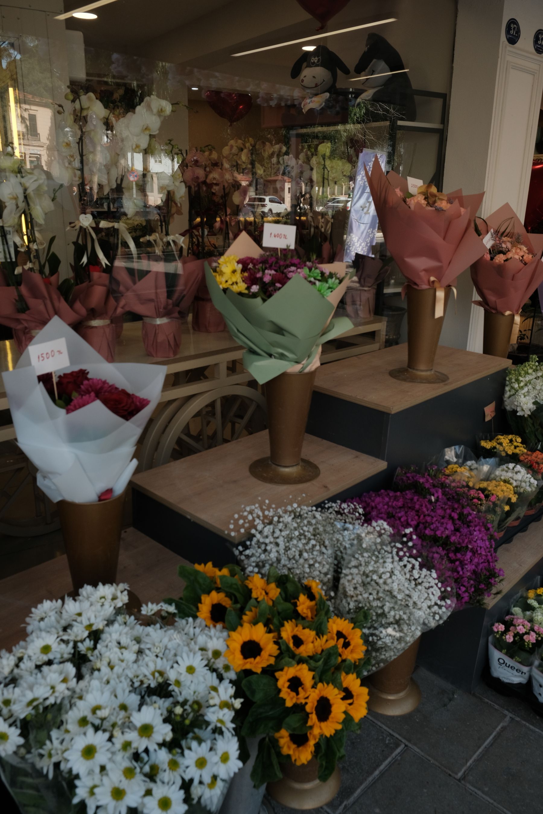Colourful bouquets of cut flowers on display at a florist shop